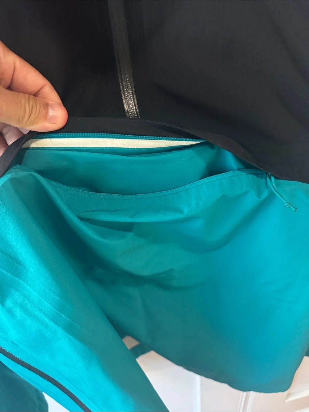 The North Face Men's Two-Tone Hooded Anorak Rain Jacket in Teal and Black